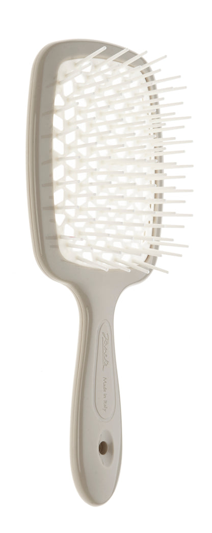 SUPERBRUSH - INNOVATION IN YOUR HANDS THE PNEUMATIC BASE OF THE BRUSH FEATURES A